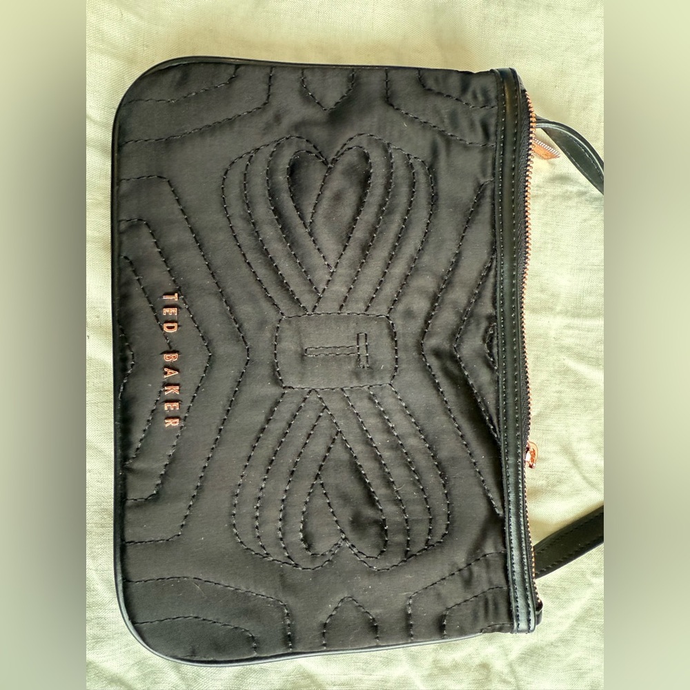 Ted Baker Black Quilted crossbody with Rose Gold metal lettering and zippers.